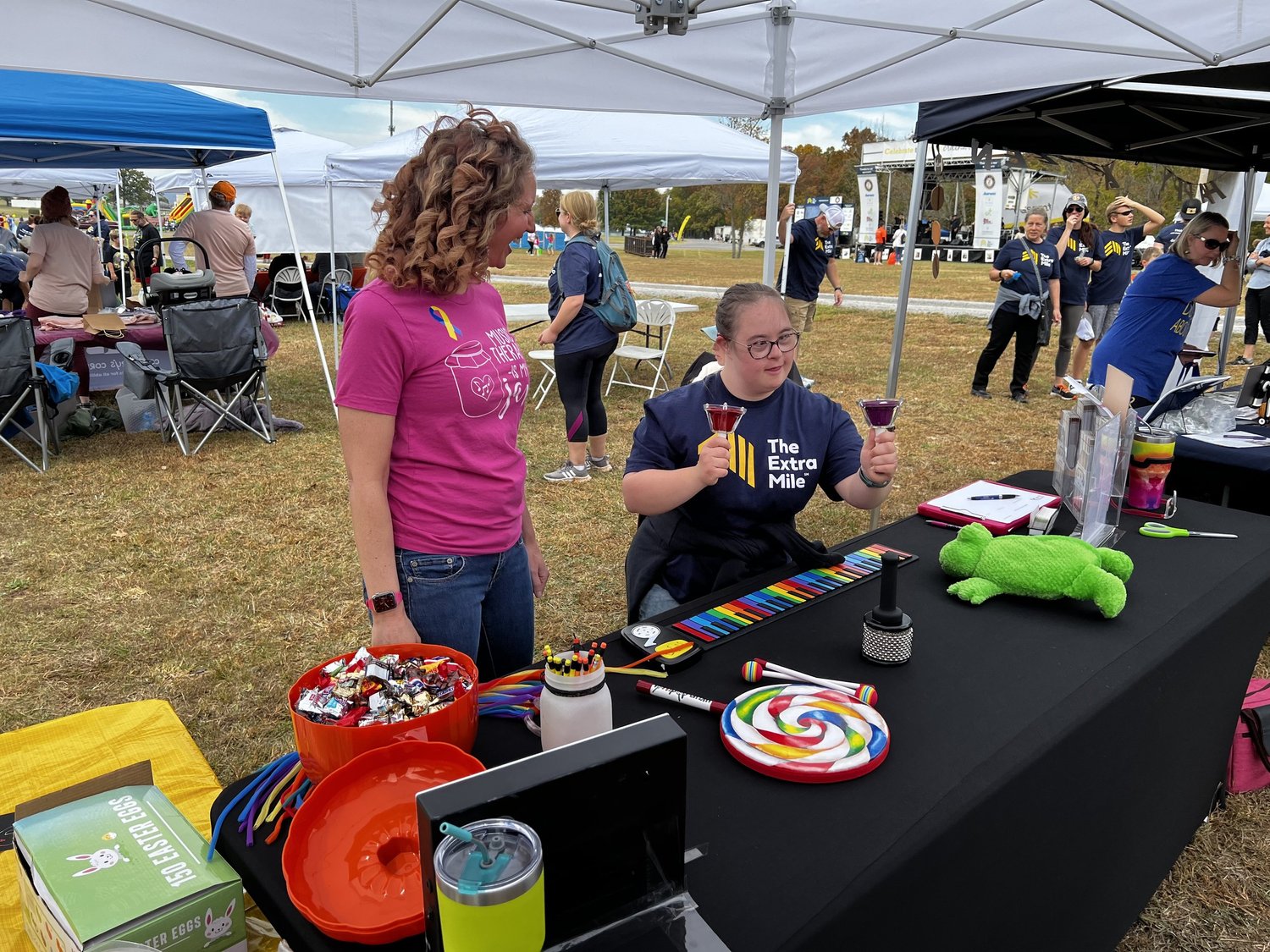 Melissa with adult playing handbells